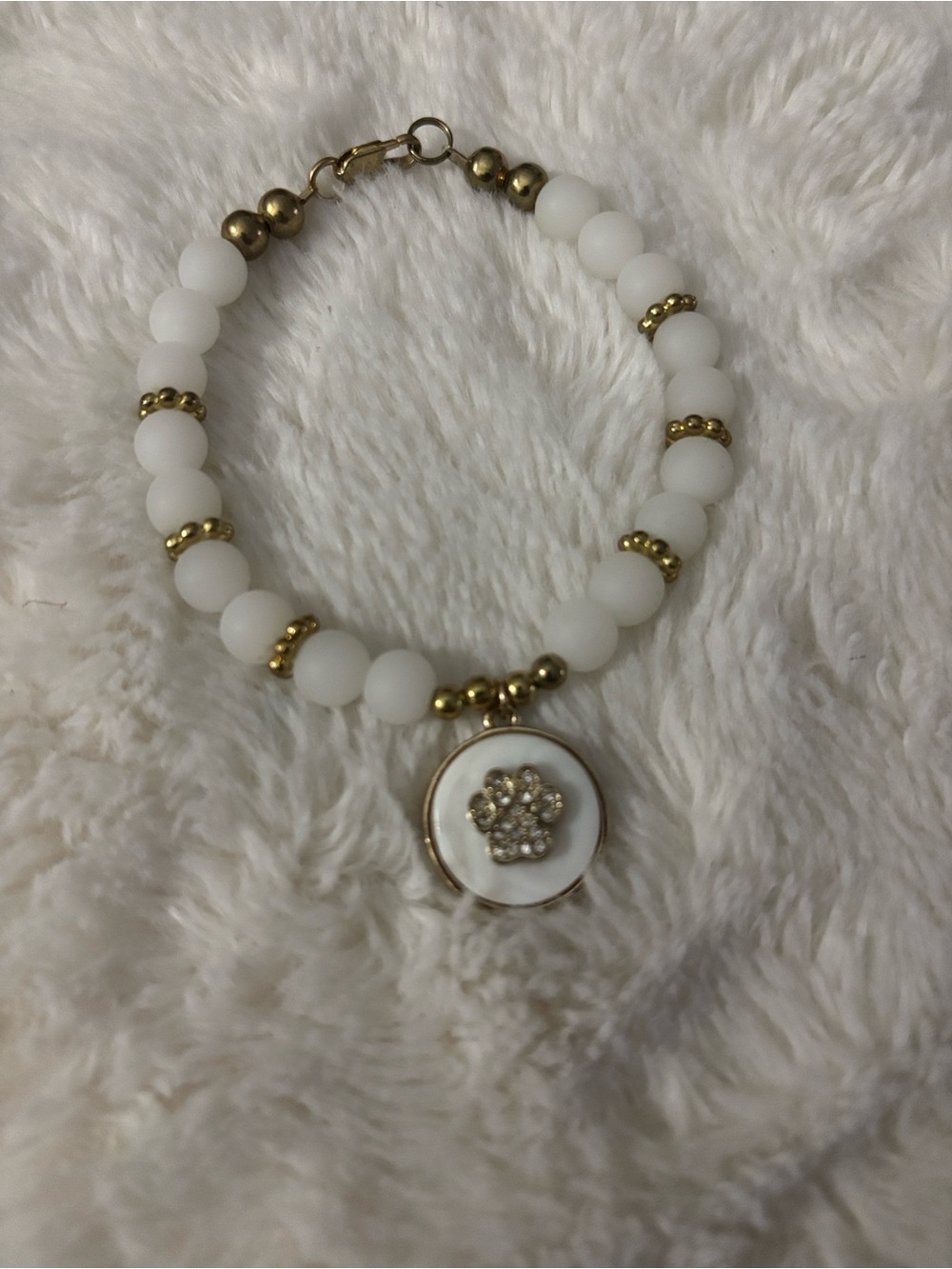 White Beaded Handmade Bracelet with Gold Accents and Crystal Charm 🐾